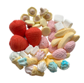 A pile of assorted miniature Swedish candies shaped like strawberries, bananas, ice cream cones, marshmallows, and flower petals in red, pink, yellow, blue, and white, isolated on a white background.